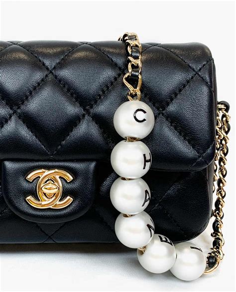 chanel small bag with pearl chain|Chanel pearl bag price.